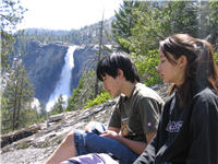 Stuart and Taylor check out the view with Nevada Falls behind them